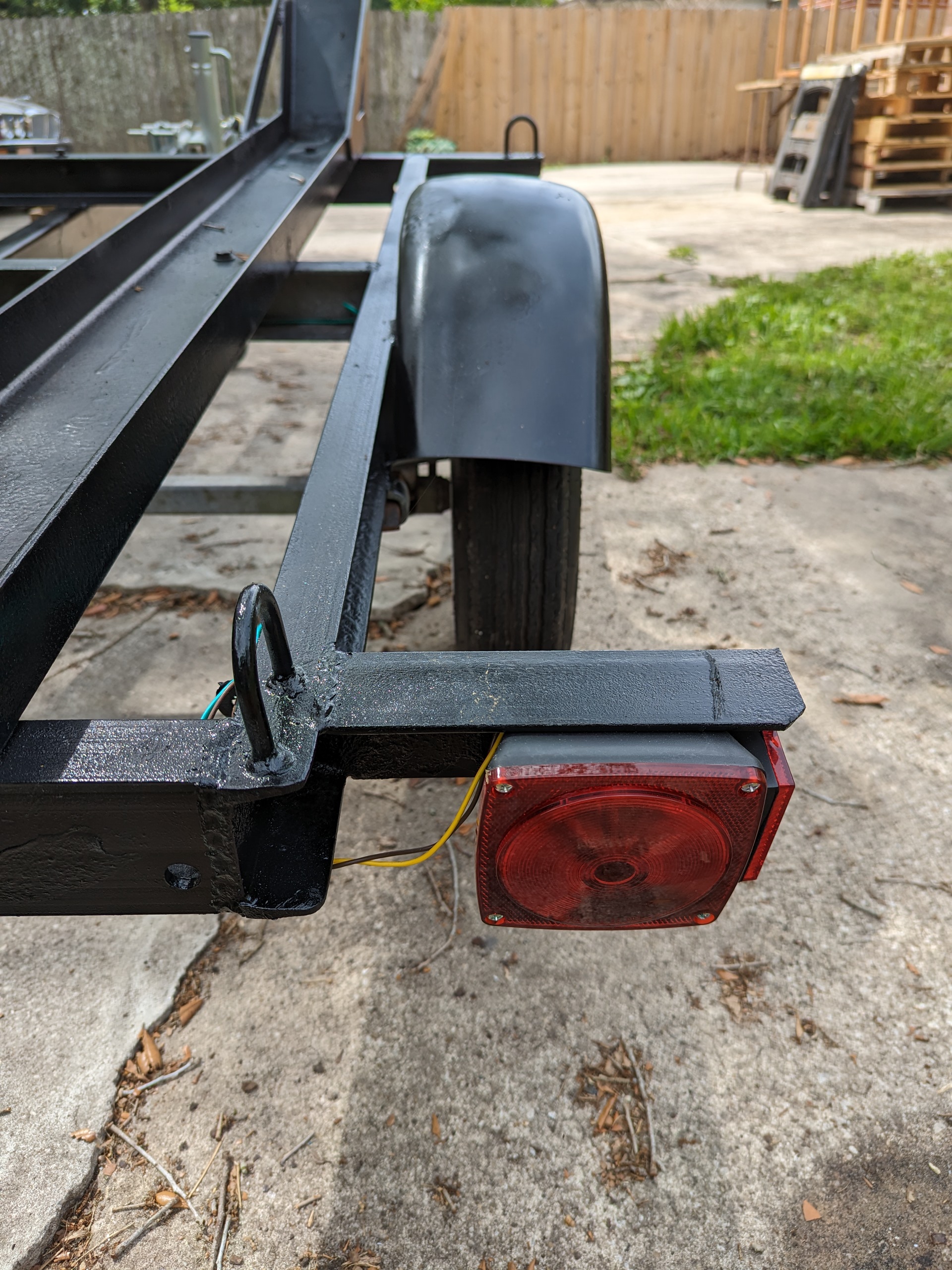 Tail light on a motorcycle trailer.